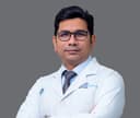 Dr. Basil Mathew