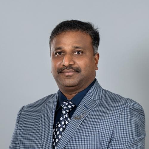 Dr. Cibi Isaac