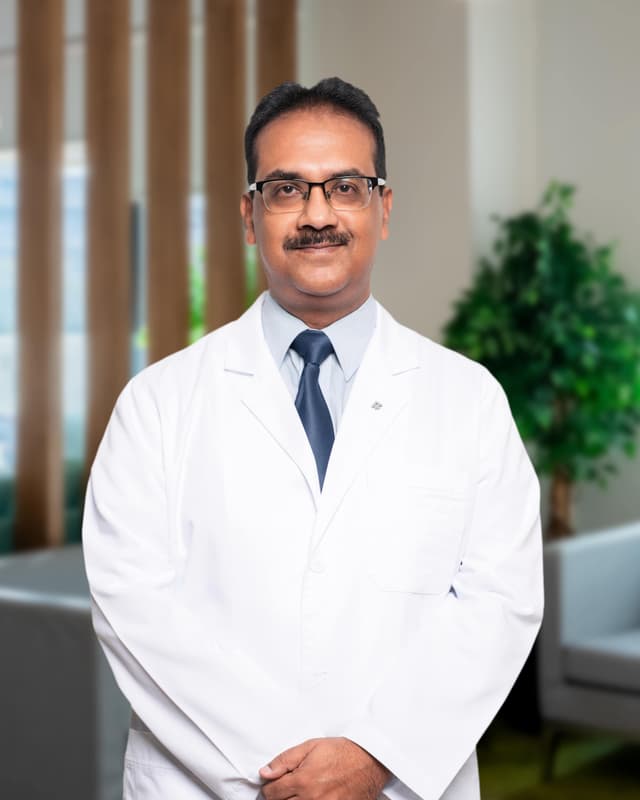 Dr. Viji George