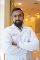 Dr. Arun George