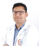 Dr. RAHUL THAMBI