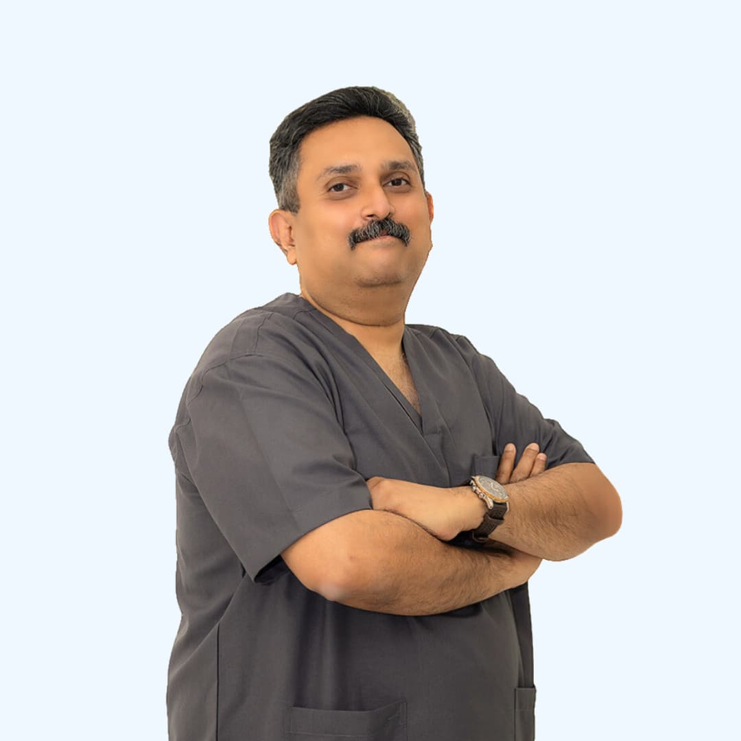 Dr. Urumese Mampilly